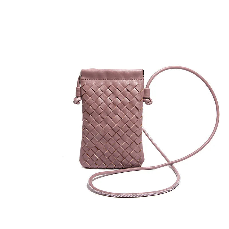Vertical square vintage weave crossbody bag in multiple colours showing internal dark cell phone pocket.