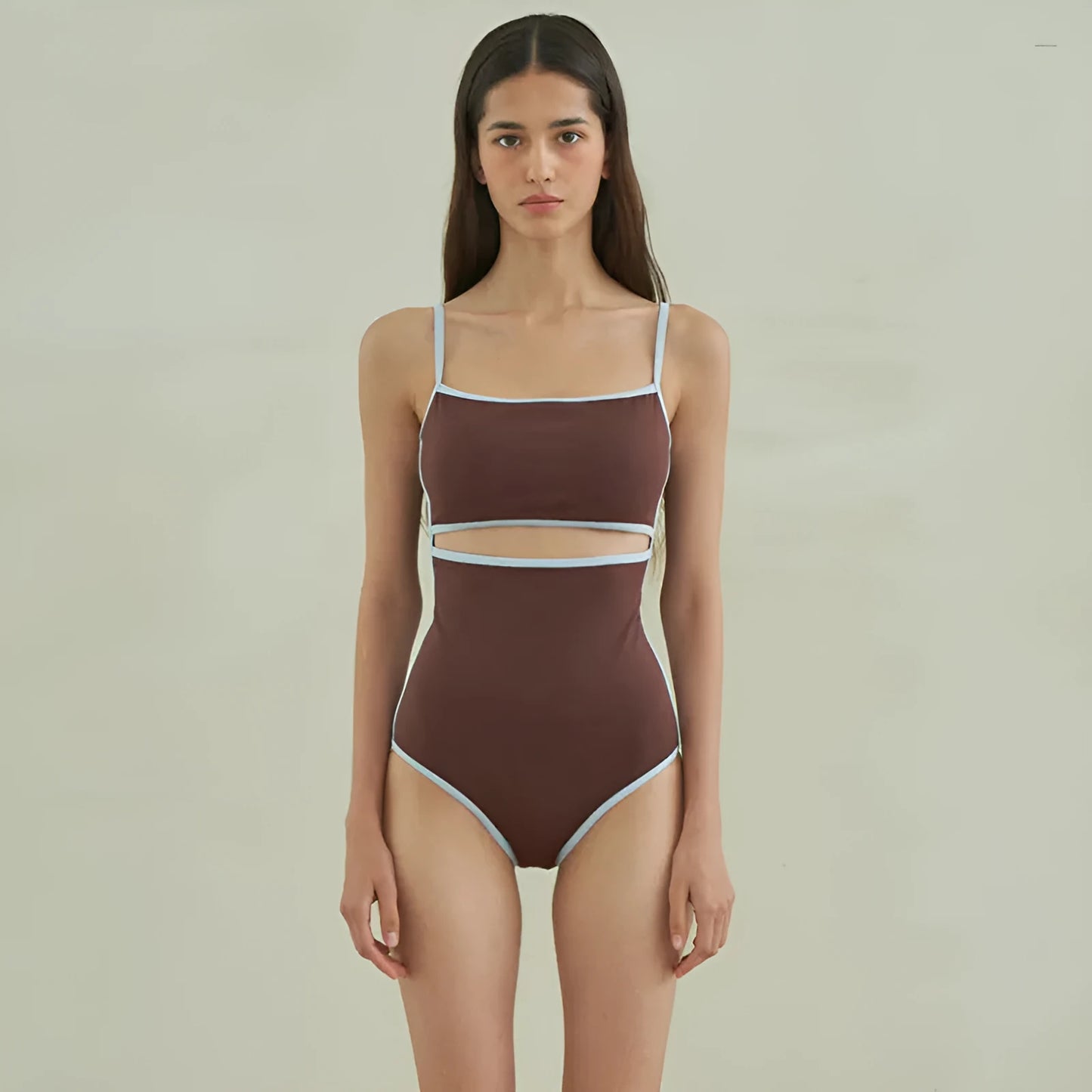 Brown women's one-piece swimsuit with V-neck front and adjustable tie straps at neck and back.
