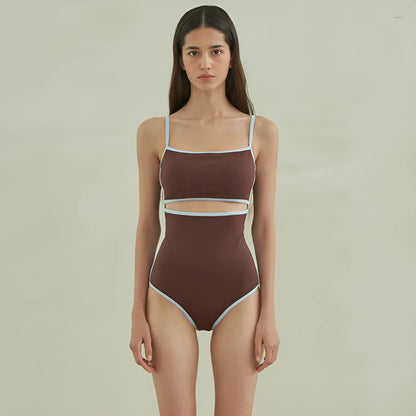 Brown women's one-piece swimsuit with V-neck front and adjustable tie straps at neck and back.