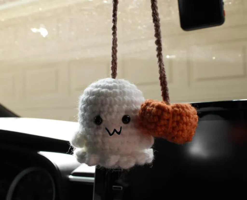 Soft, hand-woven plush car hanging ornament in a cartoon character design.