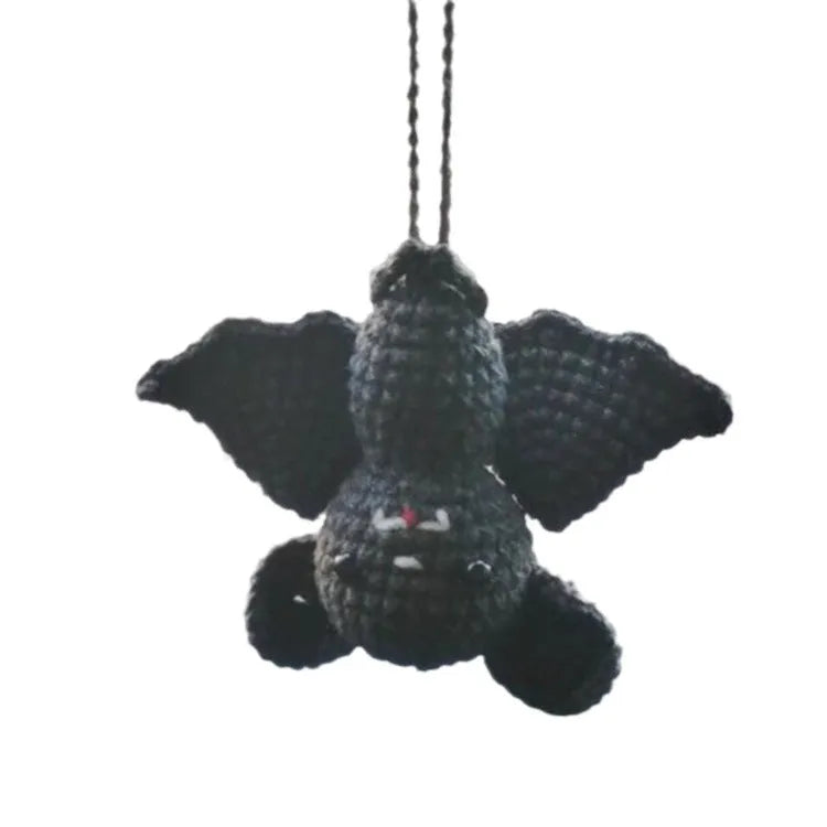 Soft, hand-woven plush car hanging ornament in a cartoon character design.