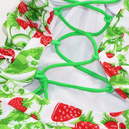 Women's one-piece swimsuit with cross strap backless design and strawberry pattern in blue colour