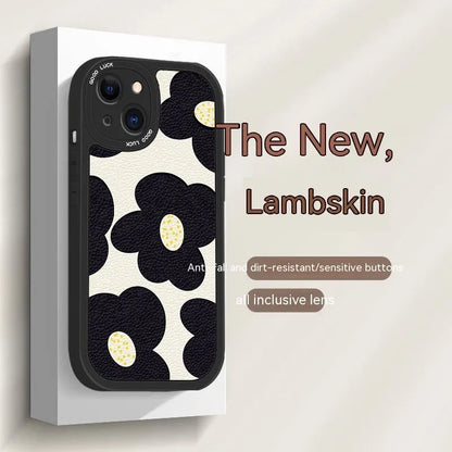 Anti-drop silicone phone case with black flower design, all-inclusive shockproof cover for iPhone models in white or black