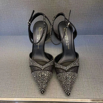 Women's hollow high heels with red sole, stiletto heel, and pointed toe in silver or black colours