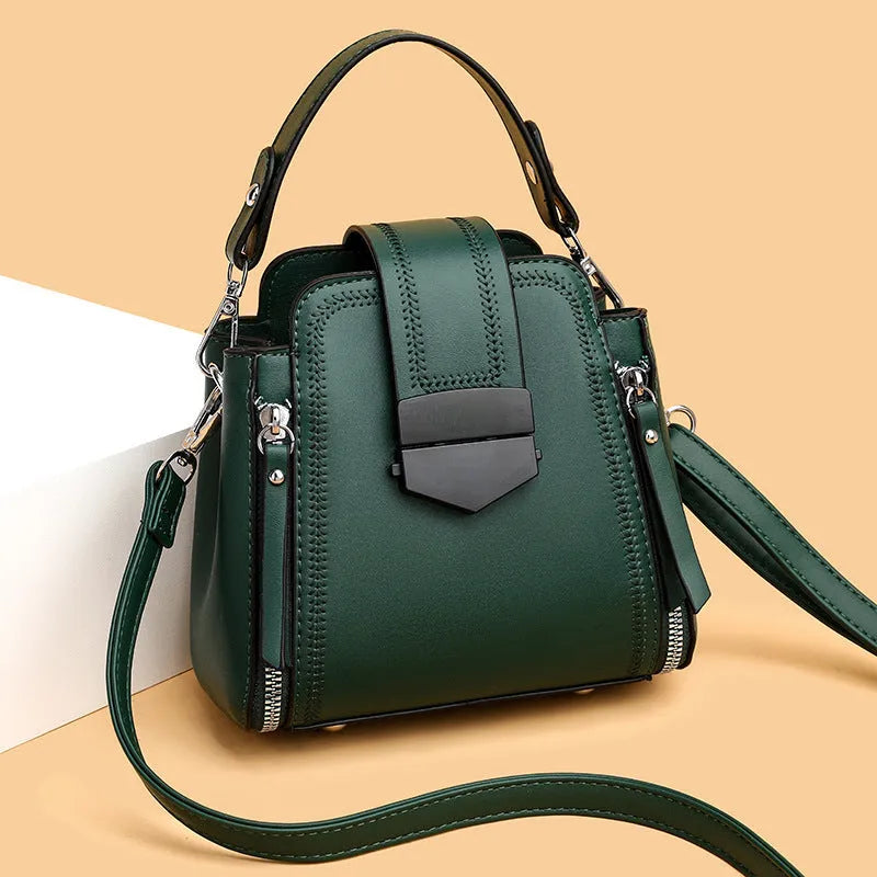 Soft PU leather ladies handbag with textured surface and sewing thread detailing in square vertical shape