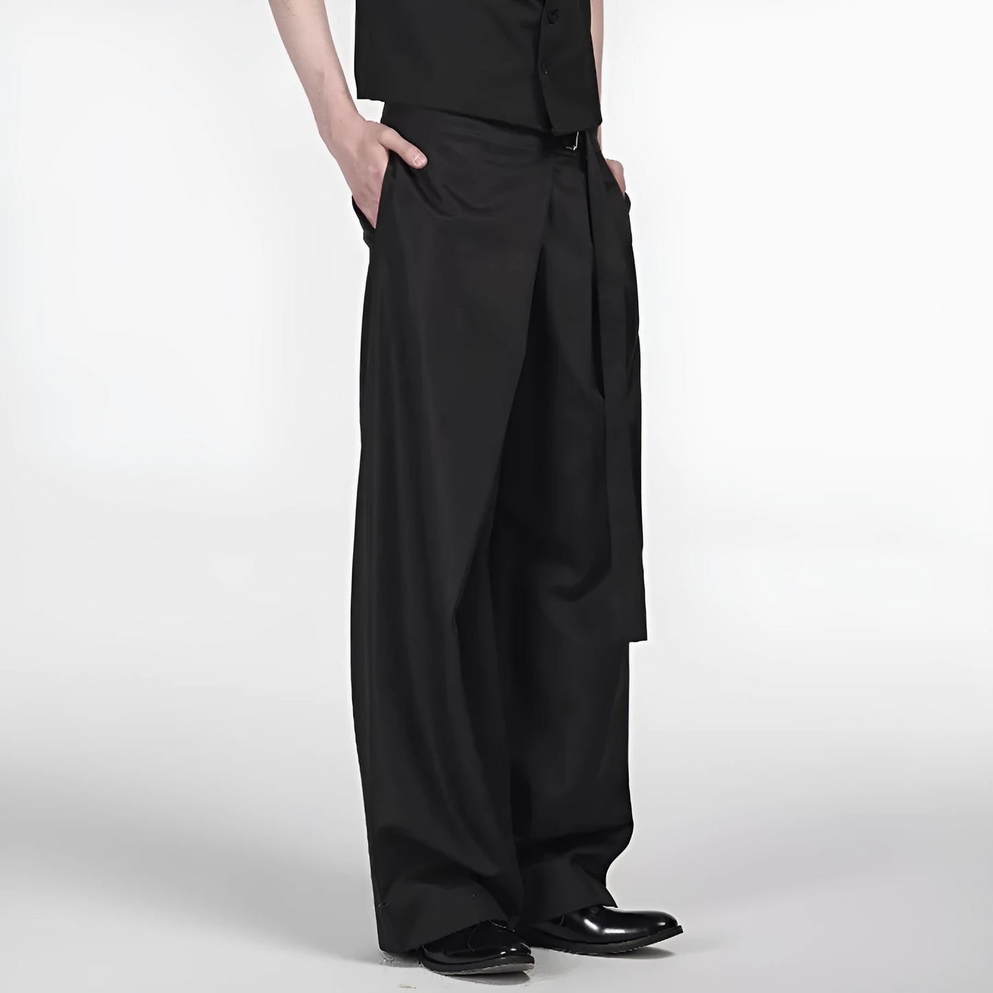 Black straight-leg trousers with a single front pleat and adjustable mid-waist on a hanger.