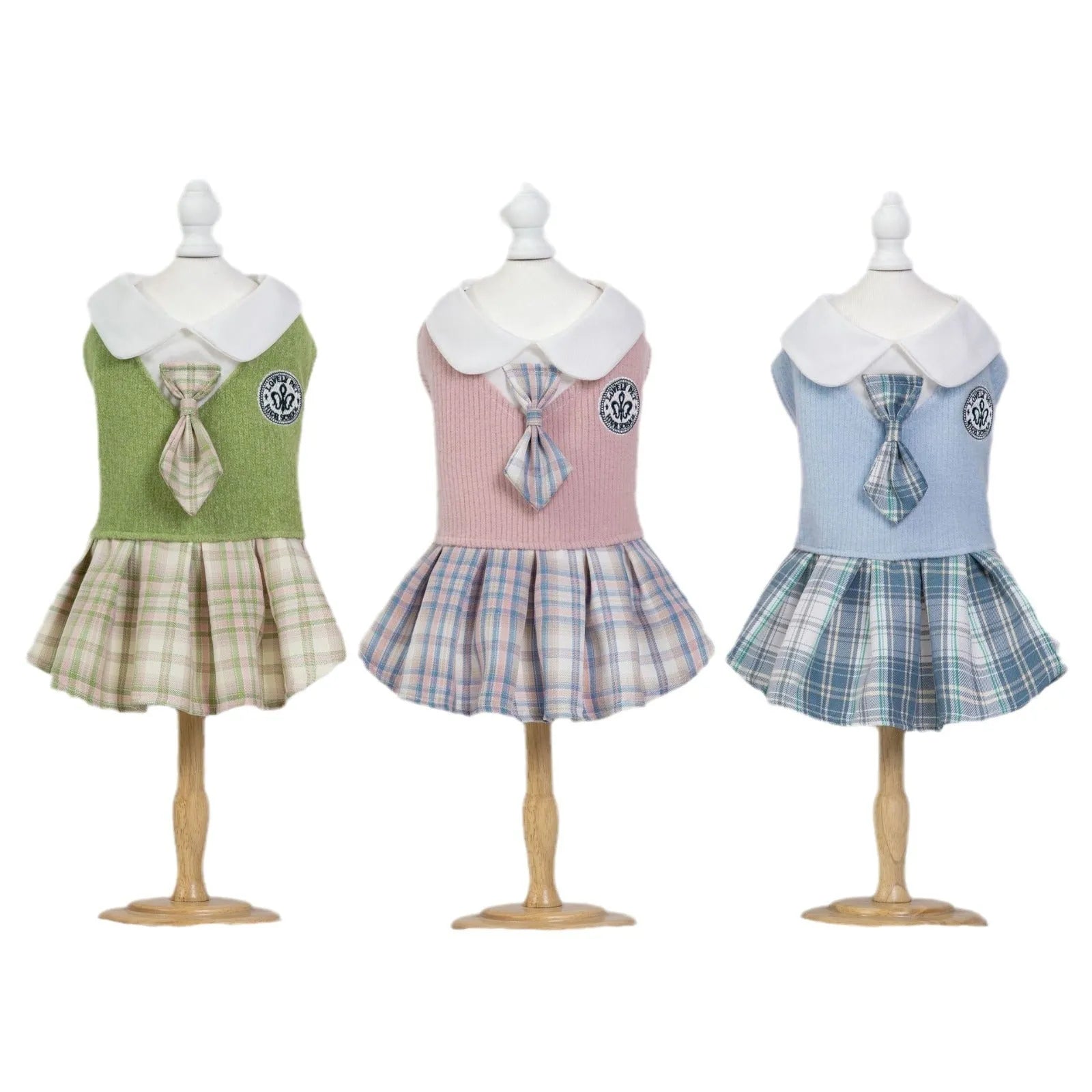 A pink, blue, or green tartan skirt for dogs and cats, shown in a princess style.