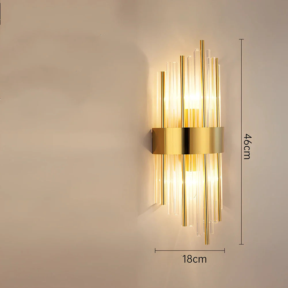 Crystal bedside lamp with stainless steel base and transparent shade providing soft illumination
