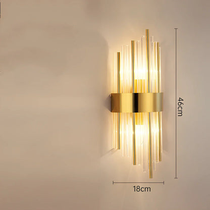 Crystal bedside lamp with stainless steel base and transparent shade providing soft illumination