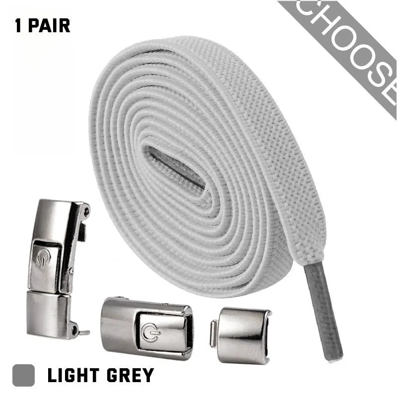 A pair of black widened flat elastic shoelaces with a silver press lock buckle on a white background.