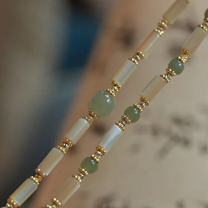 Women's Hetian Jade white lip shell bracelet with geometric round beads