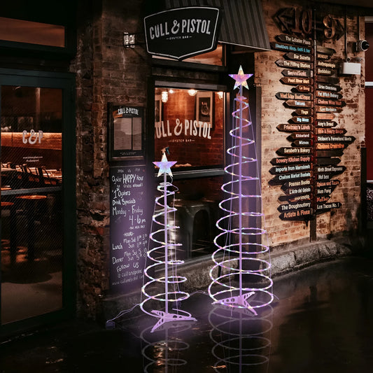 6ft tall spiral Christmas tree LED light with colour and warm white options on a detachable stand.