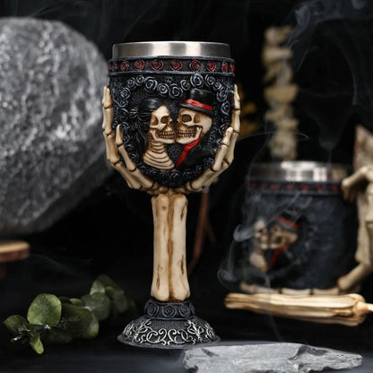 Stainless steel wine goblet with red skeleton design, 200ml capacity.
