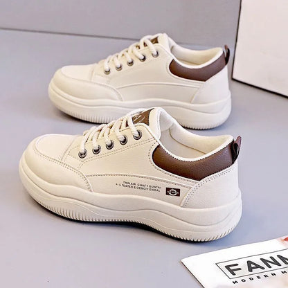 Women's white Korean-style lace-up pumps with a cross strap detail and a mid heel.
