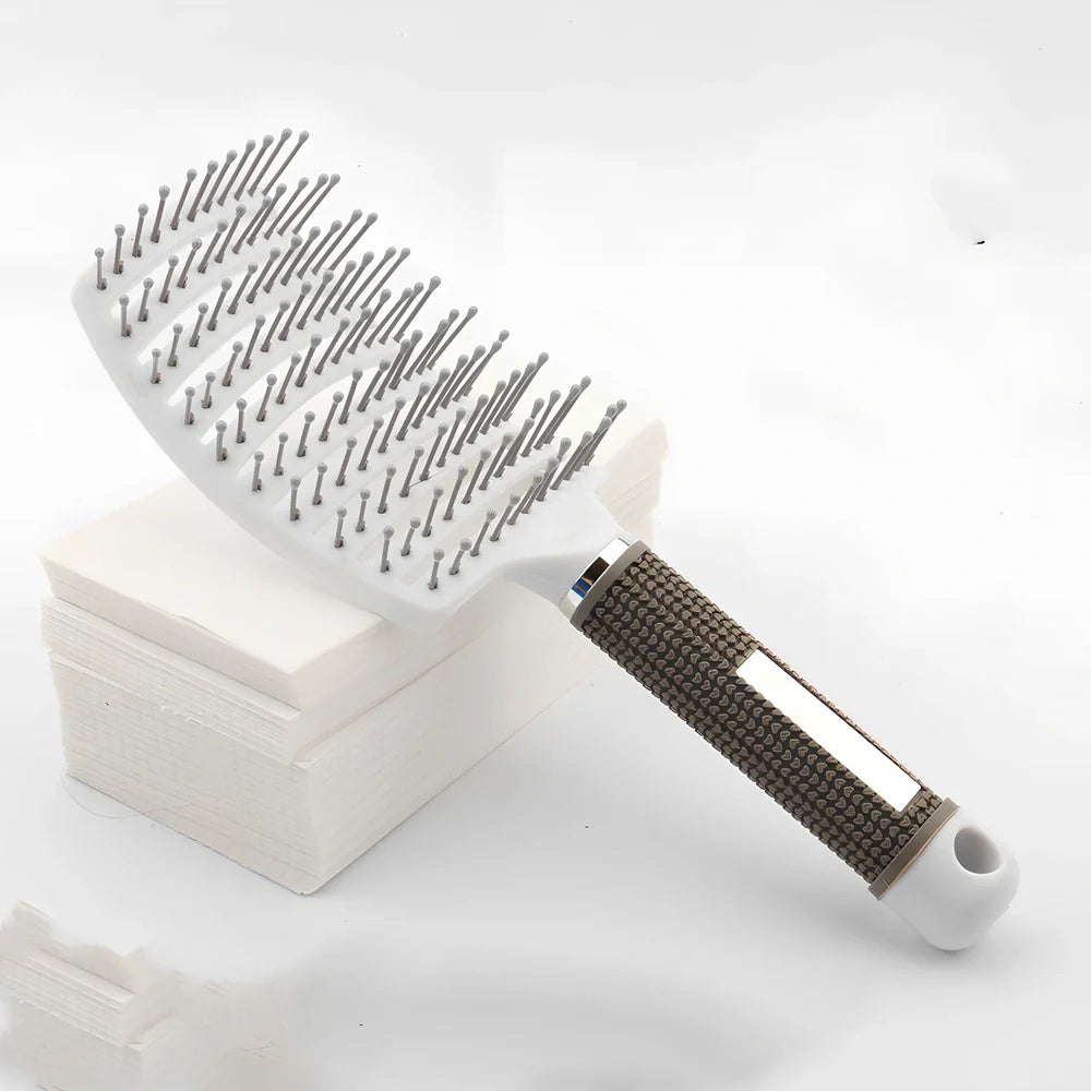 Large curved hairbrush with boar bristles showing 15cm width and natural bristle distribution
