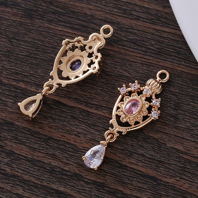 Small copper water drop pendant with zircon detailing in five colour options.