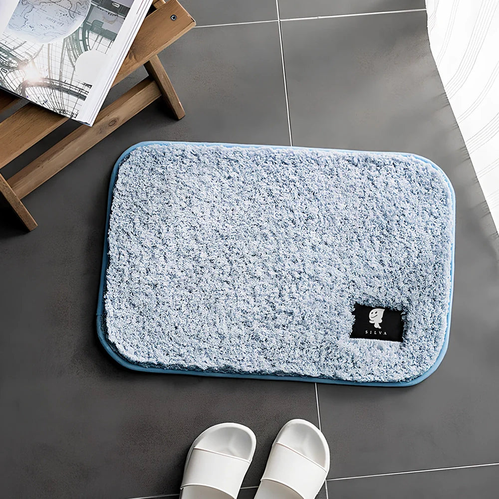 Rectangular polyester anti-slip mat in beige colour for bathroom use with non-woven construction