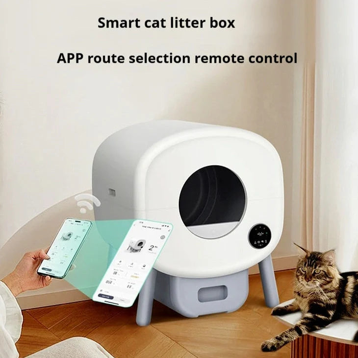 White automatic cat litter box with 550mm width, 13L waste compartment, and cleaning brush