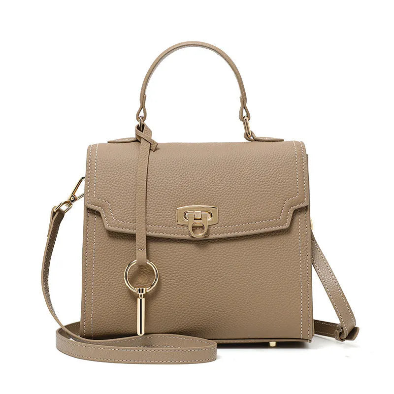 Elephant grey vintage handbag with litchi pattern leather and antique lock
