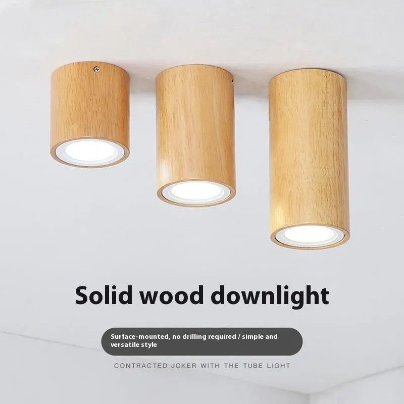 Solid wood surface mounted downlight in wood colour with round or square design options for corridor lighting
