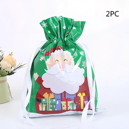 Christmas gift bag with drawstring closure in laser gold finish, 32x24cm dimensions