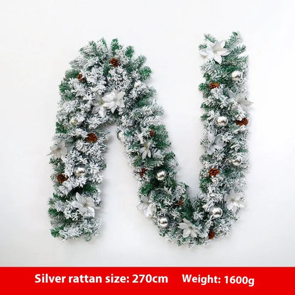 PVC Christmas rattan garland with flocked decoration in golden colour, draped as a festive vine.