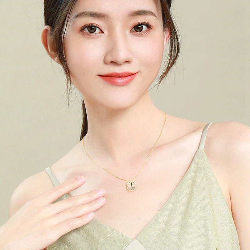 Enchanting magnetic heart-shaped four-leaf clover pendant necklace in gold, silver, and rose gold colors