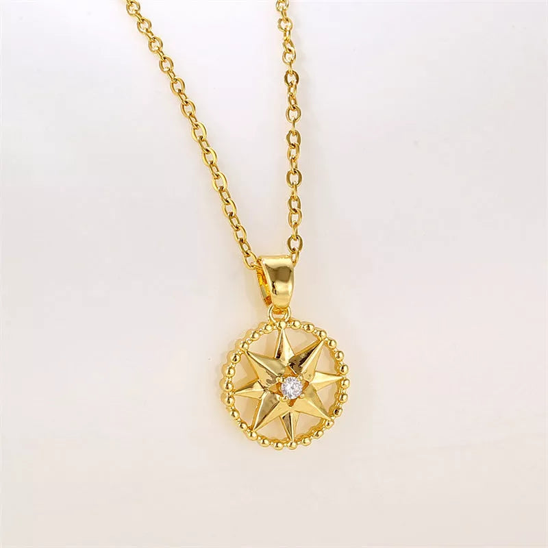 Lucky Compass Necklace with star-shaped titanium steel pendant in gold and white gold