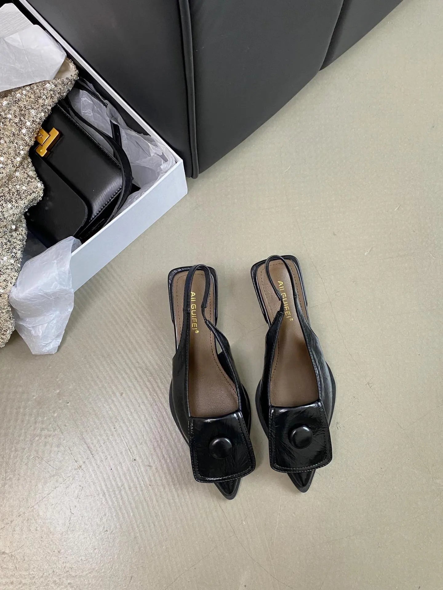 Women's low-heel pointed toe sandals with a back strap in black, brown, apricot, and silver colours.