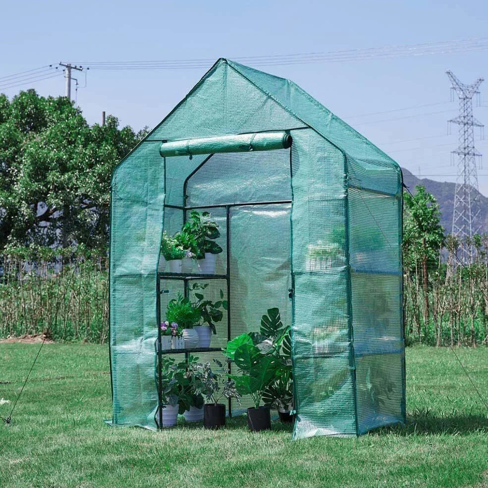 Green PE mesh greenhouse stand with steel frame measuring 143cm long by 73cm wide by 195cm tall