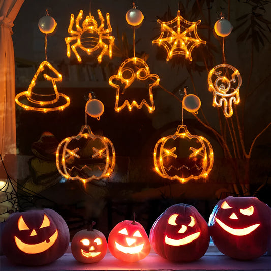 Halloween window hanging LED lights set showing spider, pumpkin and ghost designs with suction cups