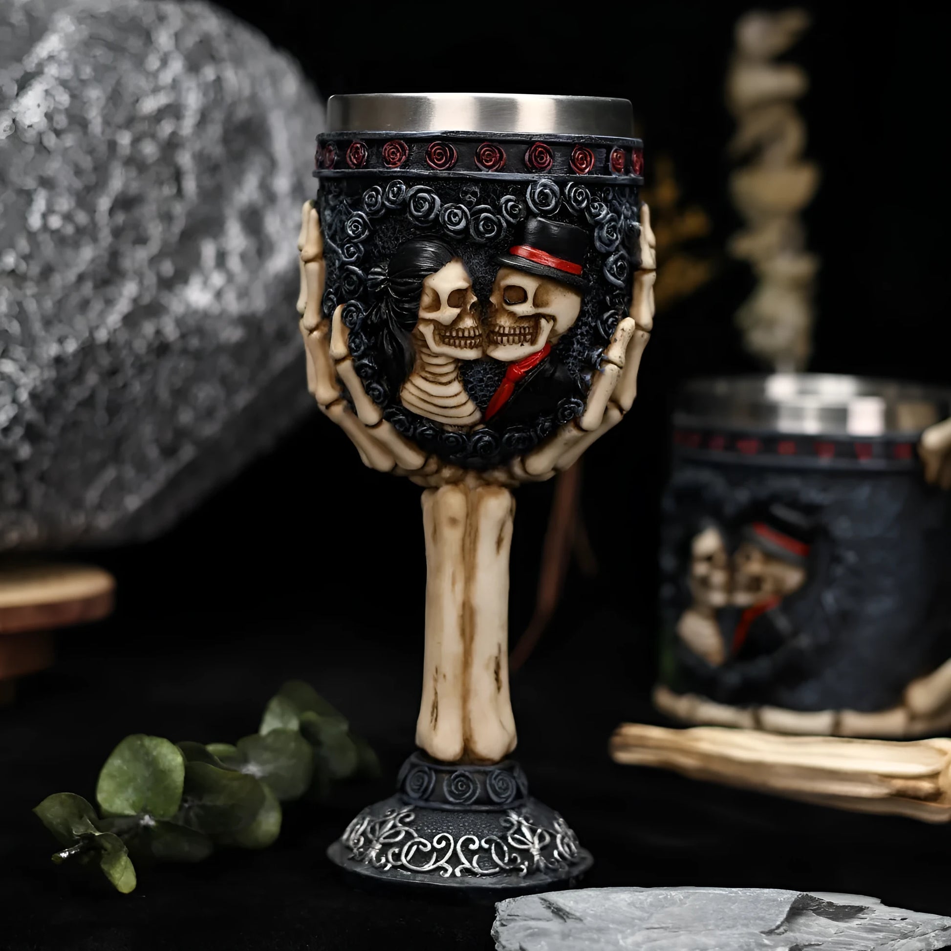 Stainless steel wine goblet with red skeleton design, 200ml capacity.