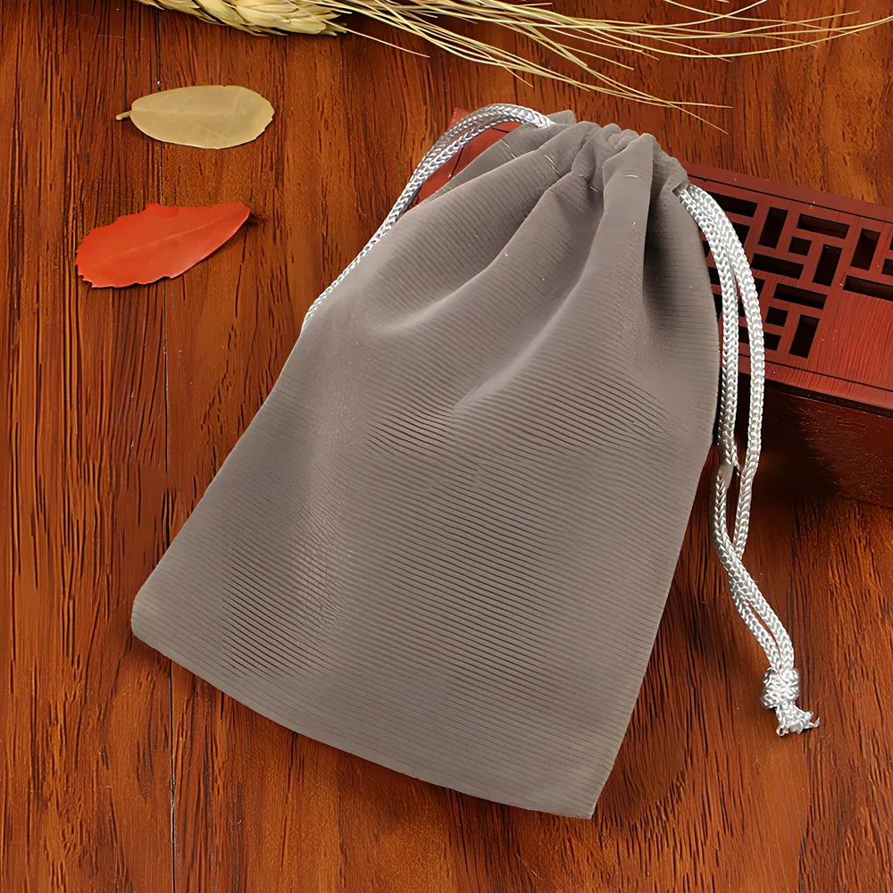 Multi-colour flannel jewellery storage bags in sizes 5x7cm to 20x30cm with gold drawstring and lining