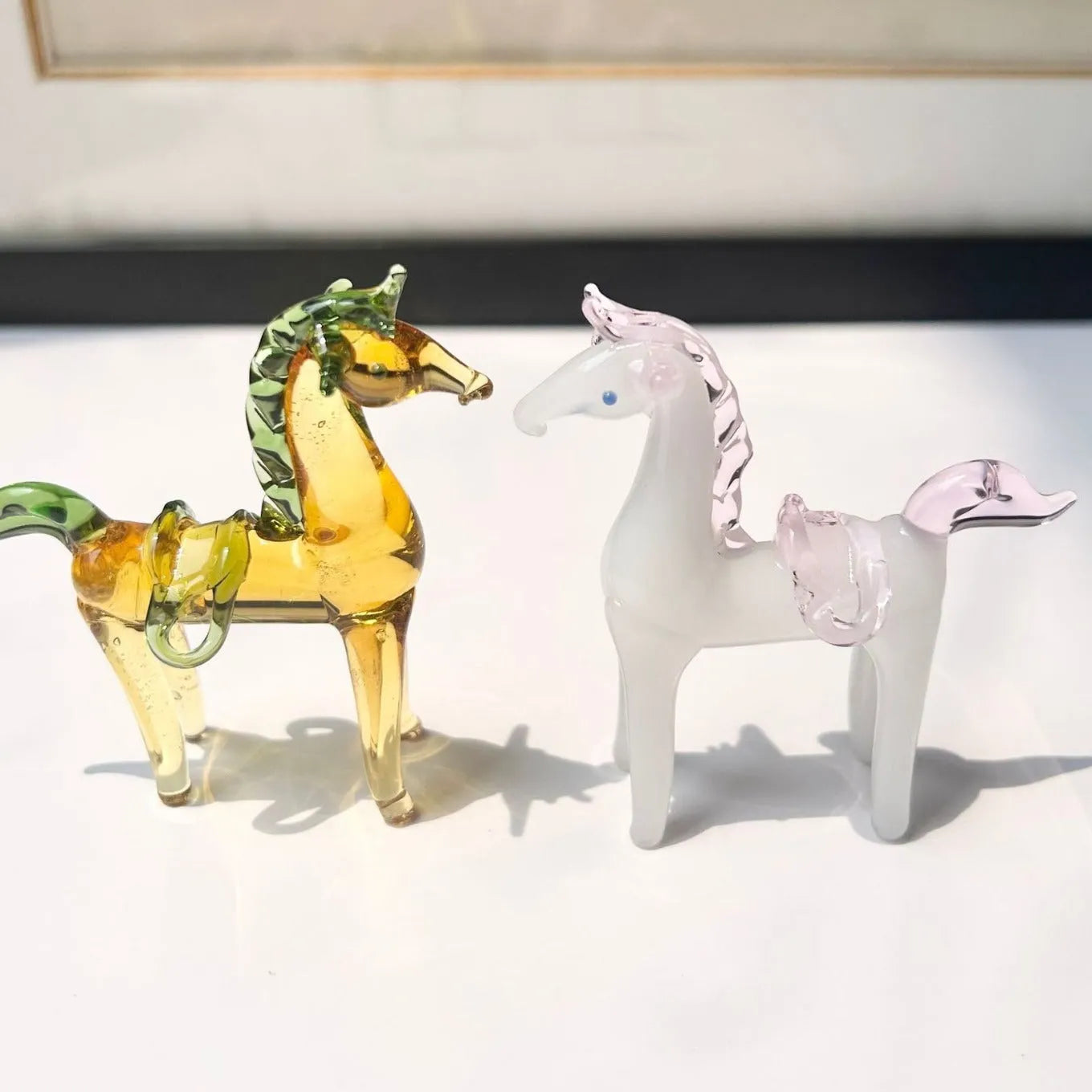 Brown glazed horse decoration on wooden desk with modern minimalist design and glossy finish