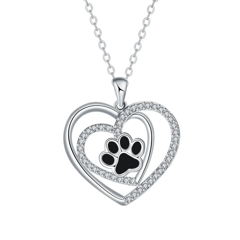 Dog's Paw Footprints Necklace for women, featuring a heart-shaped pendant with dog paw print design, crafted from copper with a cross chain style, a light luxury and minority high-sense accessory suitable as a sentimental gift or everyday jewellery.