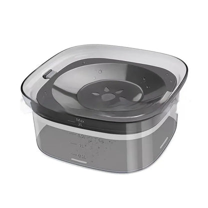 Transparent 2L dog water bowl with floating slow-feeding disk and non-slip base
