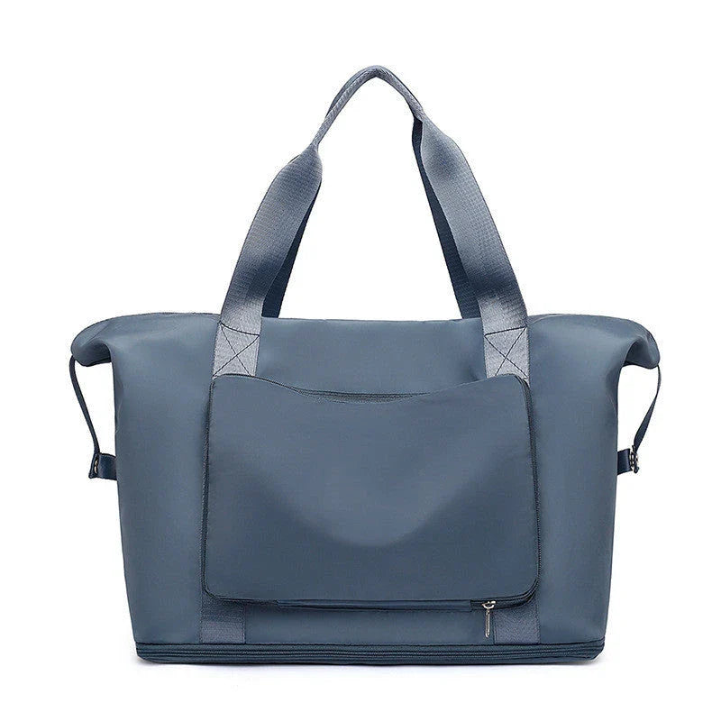 Roomy and foldable gym bag for women with waterproof Oxford fabric, multiple pockets, and wet/dry separation compartment