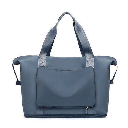 Roomy and foldable gym bag for women with waterproof Oxford fabric, multiple pockets, and wet/dry separation compartment