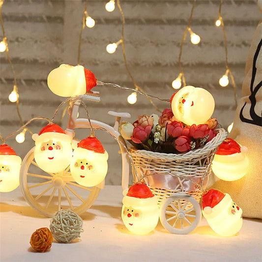 Festive Navidad LED string lights in Snowman, Snow Ball, and Santa Claus colors for holiday decorations