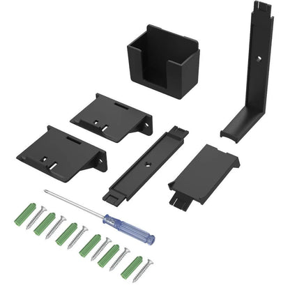 A white wall-mounted plastic hook holding a black game controller and a TV remote.