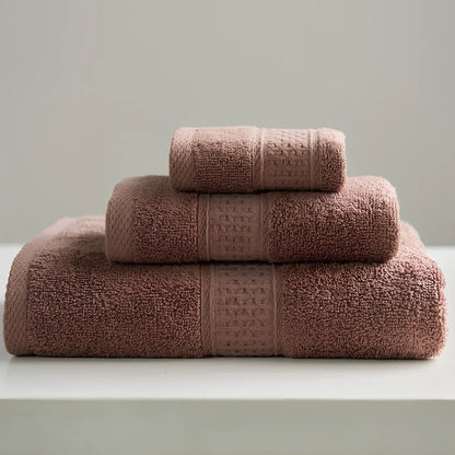 Three cotton towels: 33cm square, 32cm×73cm standard, 70cm×140cm bath towel in coordinated colours