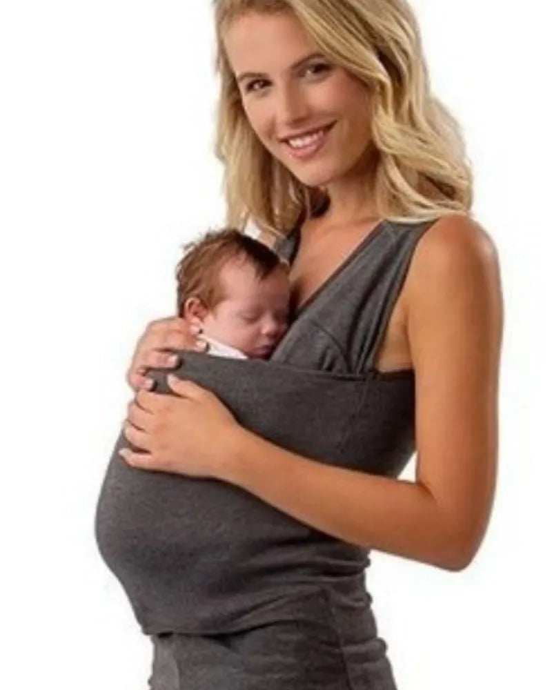 A green loose-fitting cotton short sleeve casual top with a round neck on a hanger.