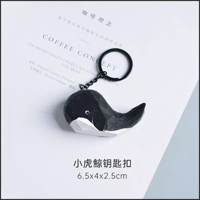 Handmade wooden cat trinkets in gray and orange, perfect for decor or gifts