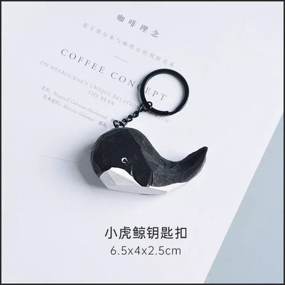 Handmade wooden cat trinkets in gray and orange, perfect for decor or gifts