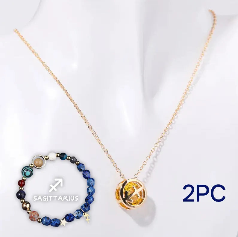 A natural stone beaded necklace and matching adjustable bracelet laid flat.