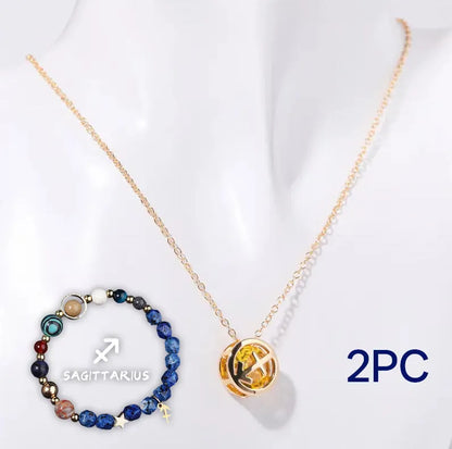 A natural stone beaded necklace and matching adjustable bracelet laid flat.