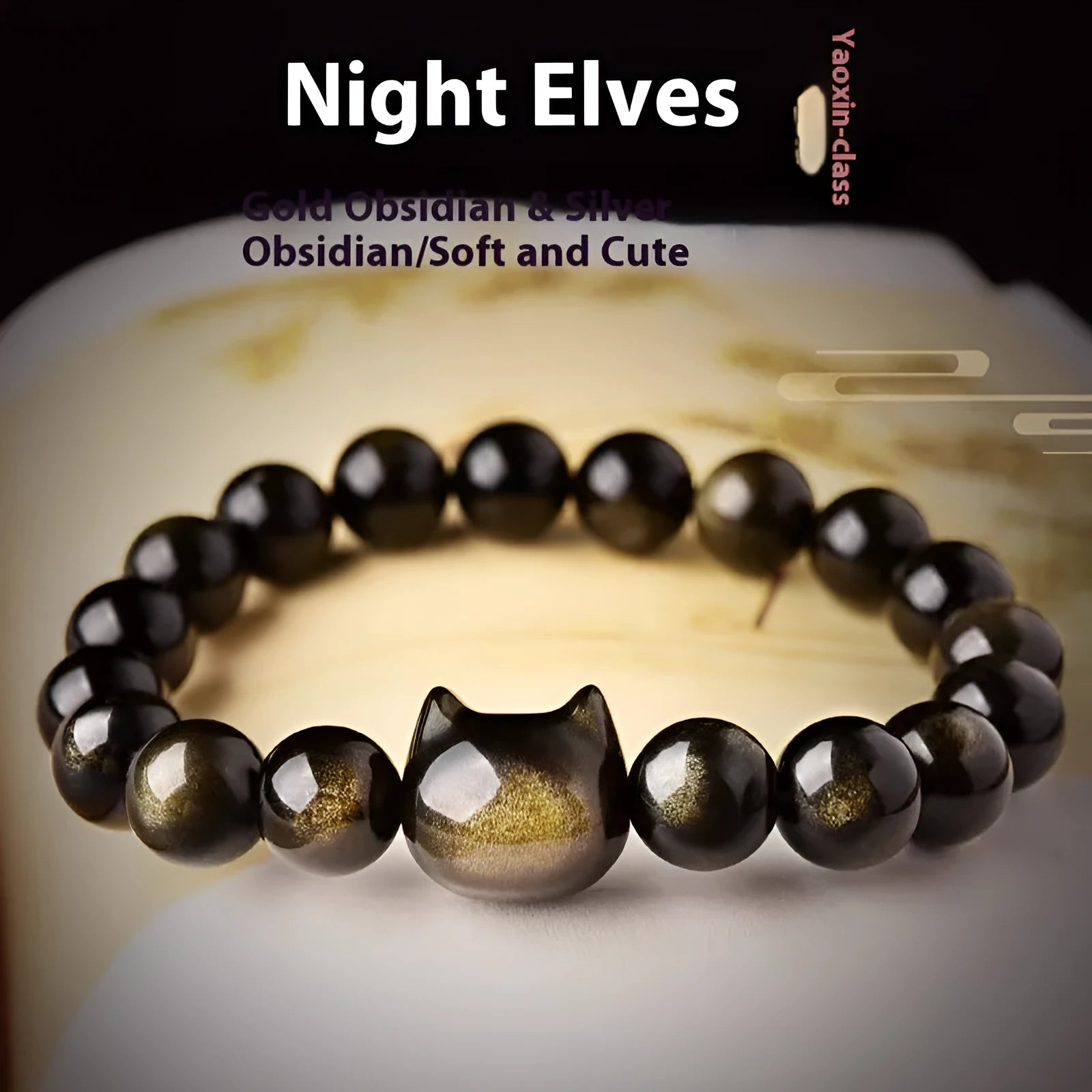 Obsidian cat head bracelet with round beads and feline charm in gold or silver style options