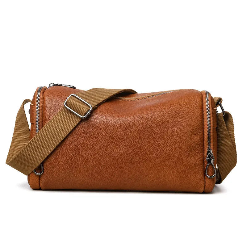 Genuine leather crossbody shoulder bag for men in black or brown with top grain cowhide and stitching detail
