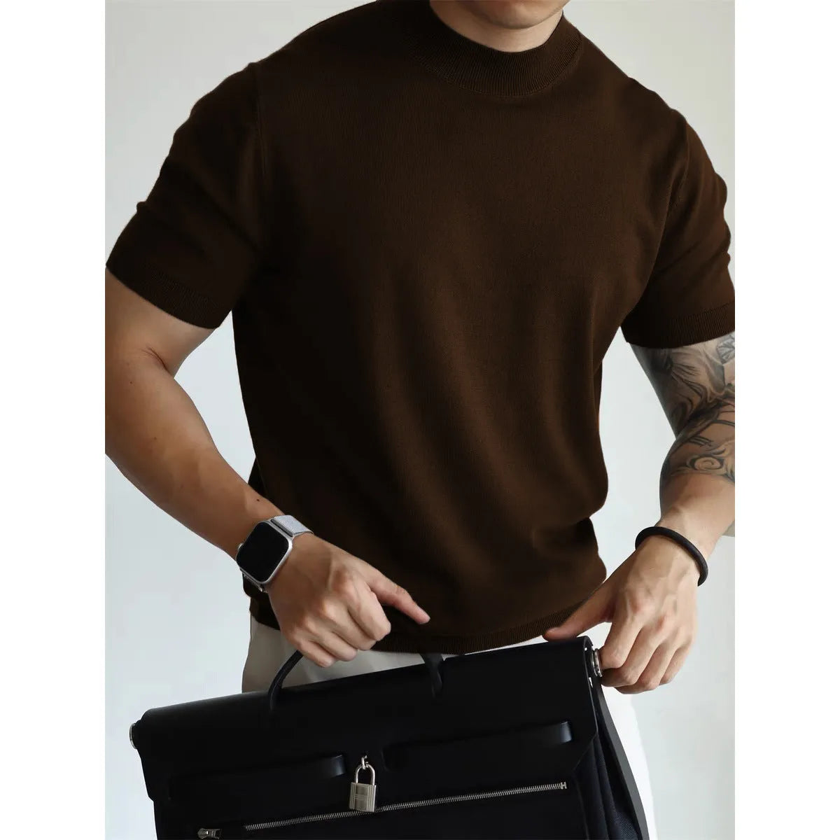 Men's slim-fit solid colour t-shirt in breathable polyester knitwear, shown in multiple colour options.