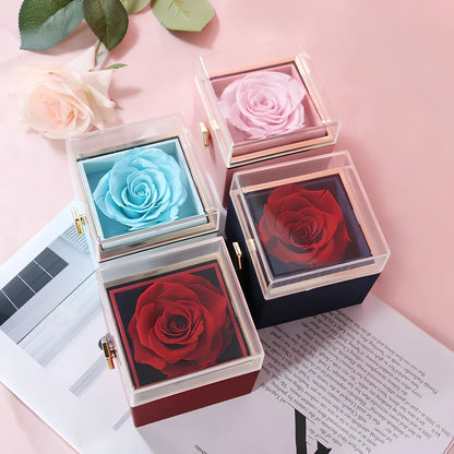 Acrylic rotating rose jewelry box in sapphire blue, 10cm diameter with three-layer storage and carrying bag